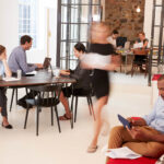 young-professionals-working-in-a-busy-open-plan-of-PSLFHTC